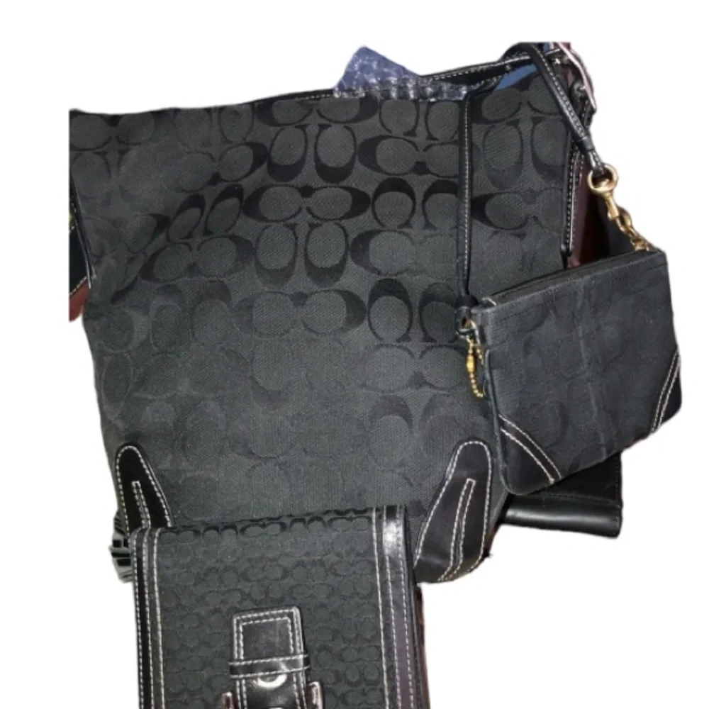 Coach black canvas monogram shoulder bag , leather trim see matching pieces